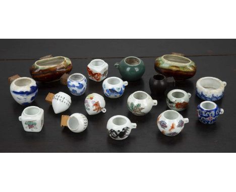 Collection of bird feedersChineseto include Republic period porcelain and other examples, with one wood feeder (18)Some marks