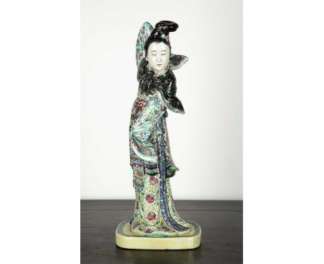 Porcelain modelChinese, Republic perioddecorated in famille verte colours, dressed in formal robes, base with impressed seal 