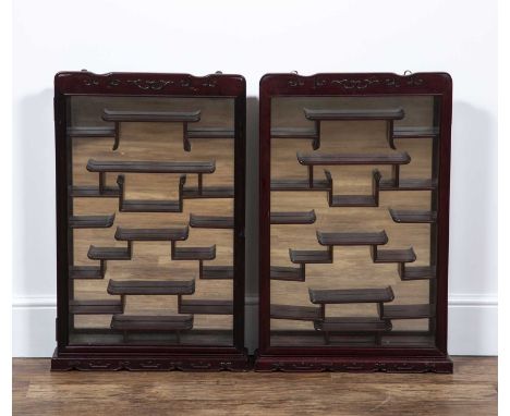 Two similar hardwood display casesChinesewall mounted and suitable for jade, netsukes, porcelain and bronzes etc, 83cm x 50cm