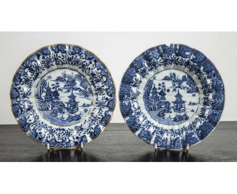 Two Nanking blue and white porcelain dishesChinese, 18th Centurydecorated to the centre of the plates with a river landscape 