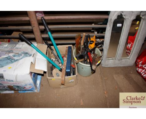 A box and bucket containing various hand tools; fire irons etc