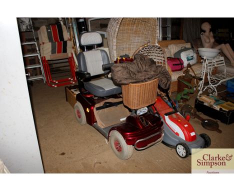 A shop rider mobility scooter with charger