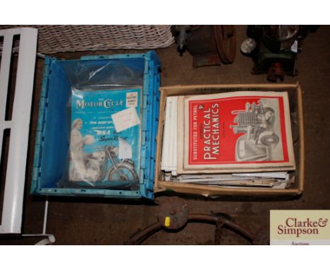 Two boxes of various engine manuals