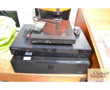 A John Lewis amplifier together with a Samsung Blu-ray disk player and a Bush DVD player