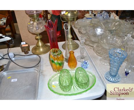 A quantity of decorative glassware to include vases, dressing table items, candlestick, paperweight etc.