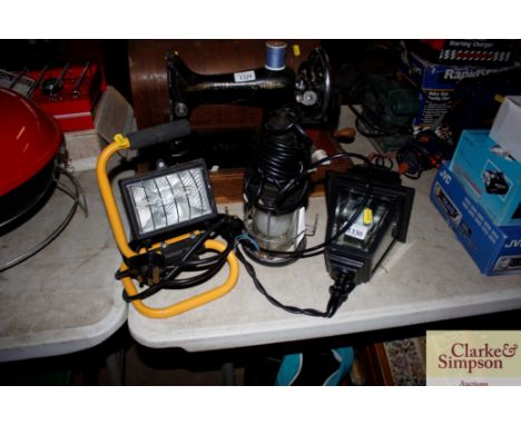 A flood light; a hanging light and a porch light