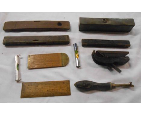 A bag containing a quantity of tools including Stanley plane, Preston &amp; Sons length calculating rule, brass and ebony spi
