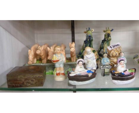 A quantity of ceramic figurines including Continental porcelain and other examples - sold with a novelty pig form toast rack,