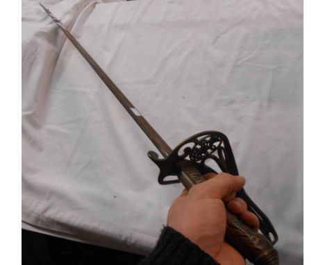 A Victorian Officer's dress sword by Henry Wilkinson with pierced brass guard and fish skin grip