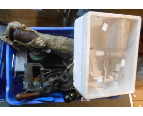 A crate containing a quantity of tools including oil cans, grease gun, spray guns, etc.