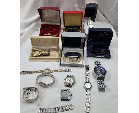 A bag containing a quantity of boxed and loose assorted wristwatches including Helvetia, Timex and Rotary examples