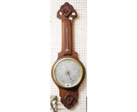 A 20th Century polished oak framed banjo barometer/thermometer with printed dial and aneroid works
