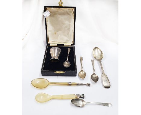 A cased silver egg cup and spoon - sold with a silver tablespoon, two teaspoons and two antler handled spoons
