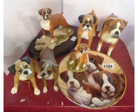 A quantity of ceramic and resin boxer dog figurines - sold with a similarly decorated collector's plate