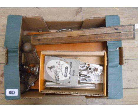 A box containing a quantity of tools including chisels, moulding plane, etc.