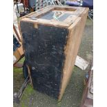 A wooden lift-top box