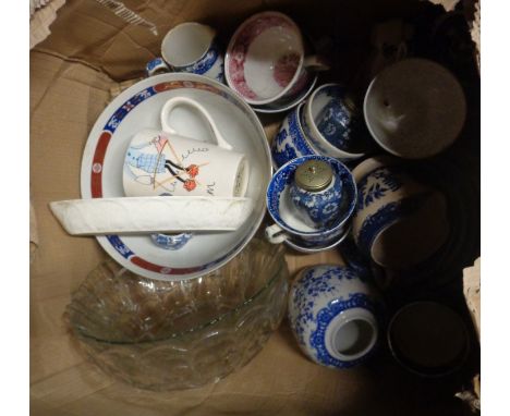 A box containing a quality of ceramics and glassware including blue and white china, glass inkwell, etc.
