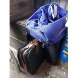 A quantity of modern suitcases and a travel bag