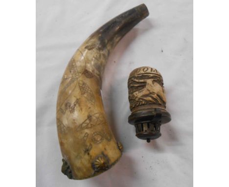 An early 20th Century carved horn flask dated 1909 - sold with an old pipe bowl with carved horse decoration and date 1700