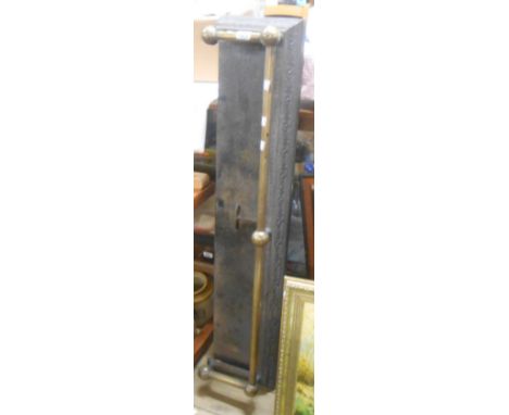A decorative old brass and cast iron fire fender