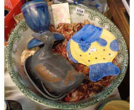 A pottery toilet bowl with transfer printed decoration containing a quantity of pot pourri - sold with ceramic candlestick, f