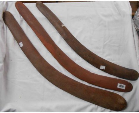 Three old Aboriginal carved wood boomerangs