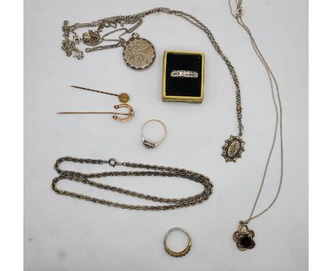 A marked 15ct. stick pin - sold with a yellow metal similar, a quantity of silver neck chains and other jewellery