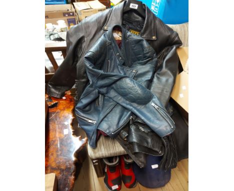 A quantity of vintage leather motorbiking clothing including two jackets - sold with a pair of Lewis Leathers motorbike trous