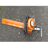 A Stihl petrol hedge cutter