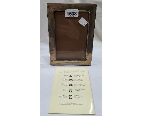 A modern Haviland-Nye silver fronted photograph frame with leatherette easel back and related pamphlet