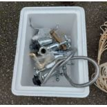 A boxed of unused bathroom taps