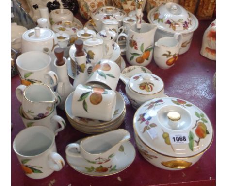 A large quantity of Royal Worcester oven to tableware decorated in the 'Evesham' pattern including tureens, coffee pot, ramek