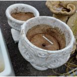 Two white reconstituted stone garden urns
