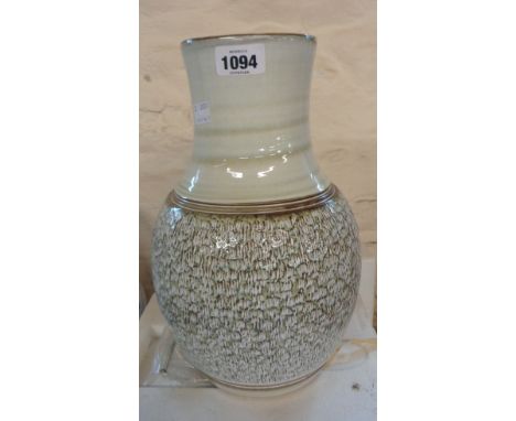 A large Denby stoneware vase with textured ground
