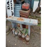 A small old rusted metal stove and paraffin heater - sold with five vintage paraffin heater drip