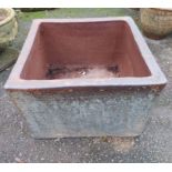 A large square glazed planter