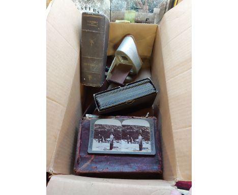 An Underwood &amp; Underwood stereoscope (card clip missing) and two boxes of cards, depicting military and topographical vie