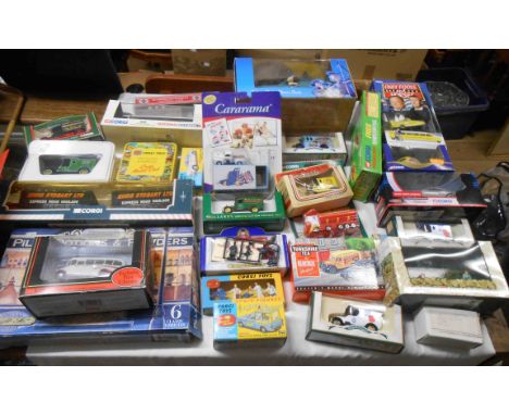 A box containing a collection of mainly boxed toy cars including Wallace &amp; Gromit radio alarm clock, Only Fools and Horse