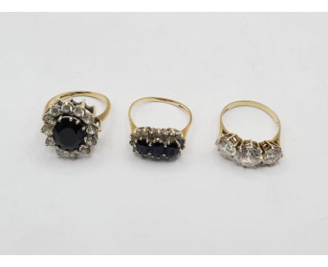 Three 375 (9ct.) gold gem, paste and CZ set dress rings - two size O, one size N