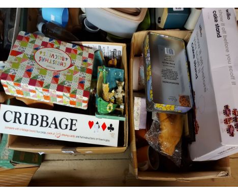Two boxes containing a quantity of mixed collectable items including a pair of novelty owl and pussycat bookends, a modern me