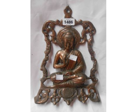A vintage Tibetan coppered metal door plaque, depicting Buddha - sold with an Indian brass temple lamp with cow decoration