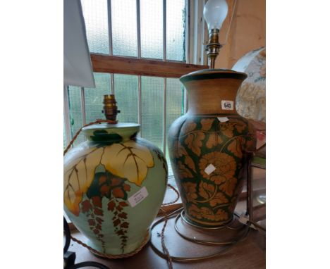 A large ceramic table lamp of vase form with painted floral decoration - sold with a hand painted green table lamp