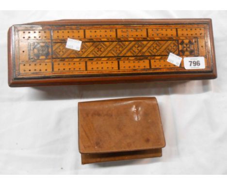 A 19th Century mixed wood cribbage board with inlaid lift-top containing two packs of playing cards - sold with a leather eff