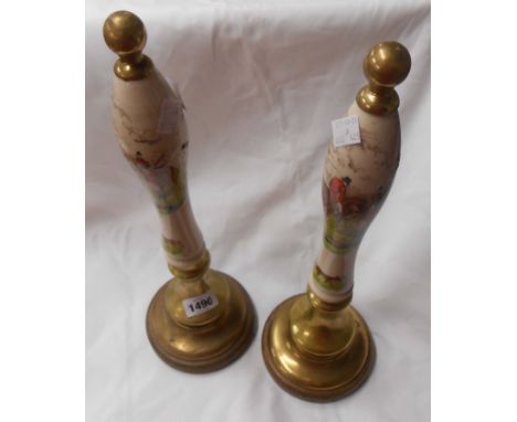 Two old beer pump handles featuring hunting scenes