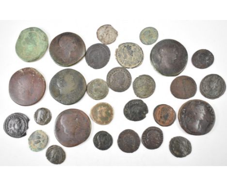 A collection of 28 Roman coins dating from the 1st century AD to the 4th century AD to include Trajan Sertertius 98 - 117AD, 