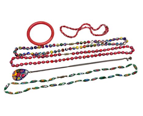 Millefiori bead necklaces, a pendant, a coral necklace, and a coral bangle