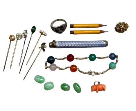A white metal guilloche enamel propelling pencil (lacking internal section), a carved coral pig pendant, a gilt charm, stick 