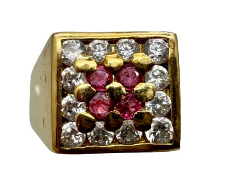 An 18ct gold, white stone and ruby ring, 8.8g, size 3
