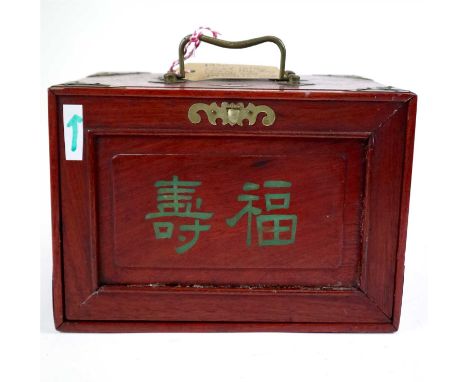 A 20th century Chinese cased Mah Jong set, the stained incised bone and bamboo tile set in a stained labelled hardwood chest 