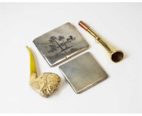 A silver engine turned cigarette case, Birmingham, together with a white metal and niello work cigarette box, a carved meersc